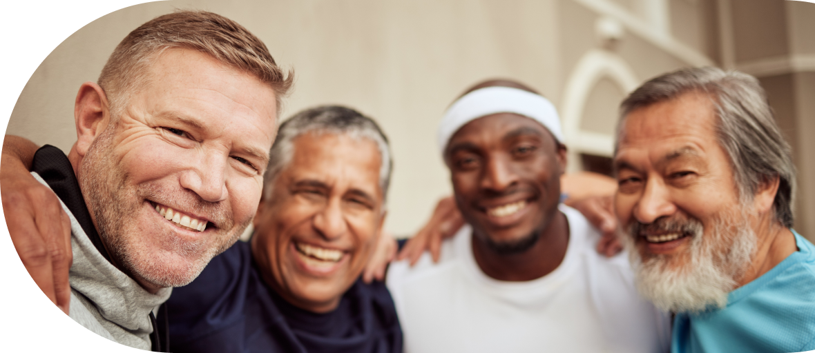 four men smiling